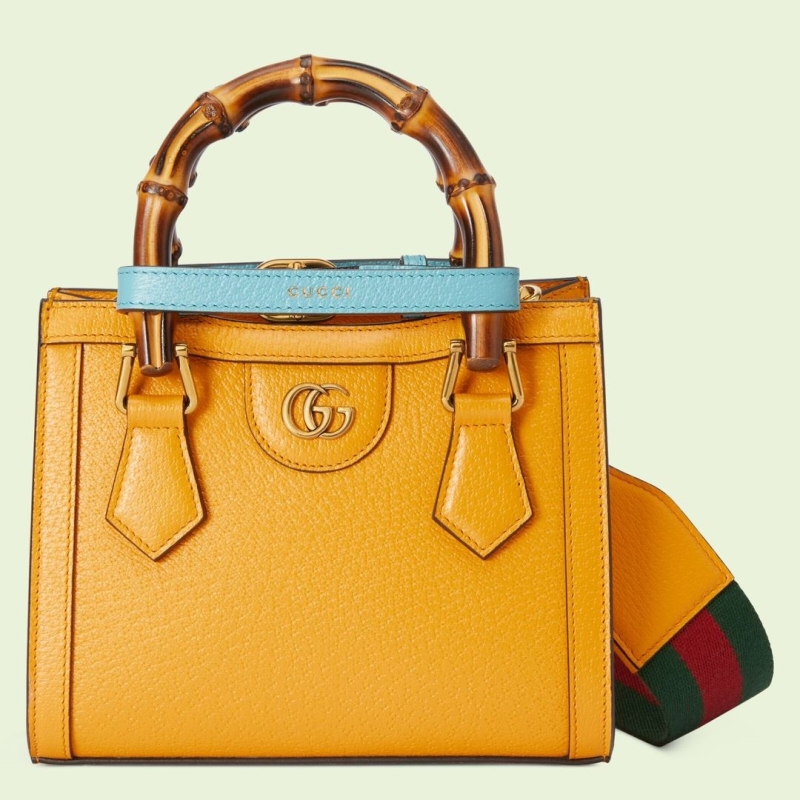 G*u*i top handle bags